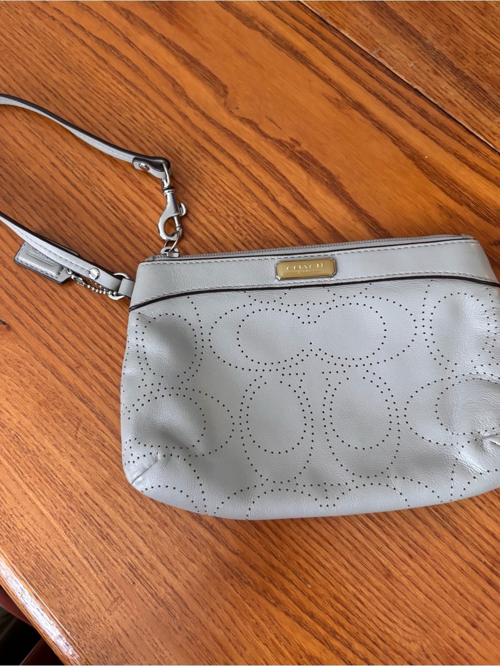 Coach Cream Perforated Leather Wristlet